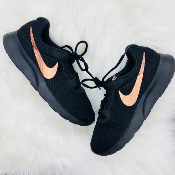 black nikes with rose gold swoosh